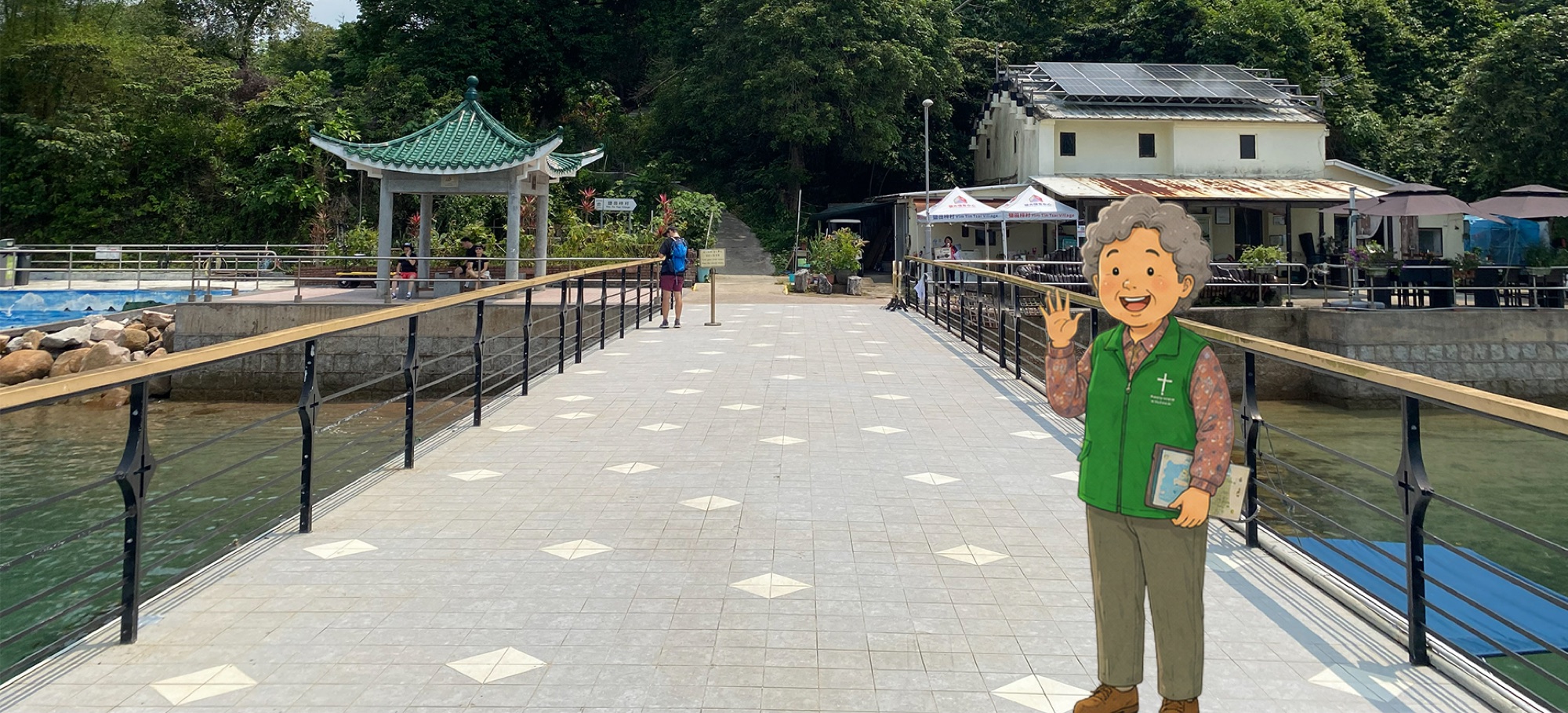Ming Yuet welcomes visitors on the pier of Yim Tin Tsai